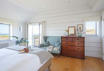 Bedroom 1 boasts panoramic views features its very own balcony.