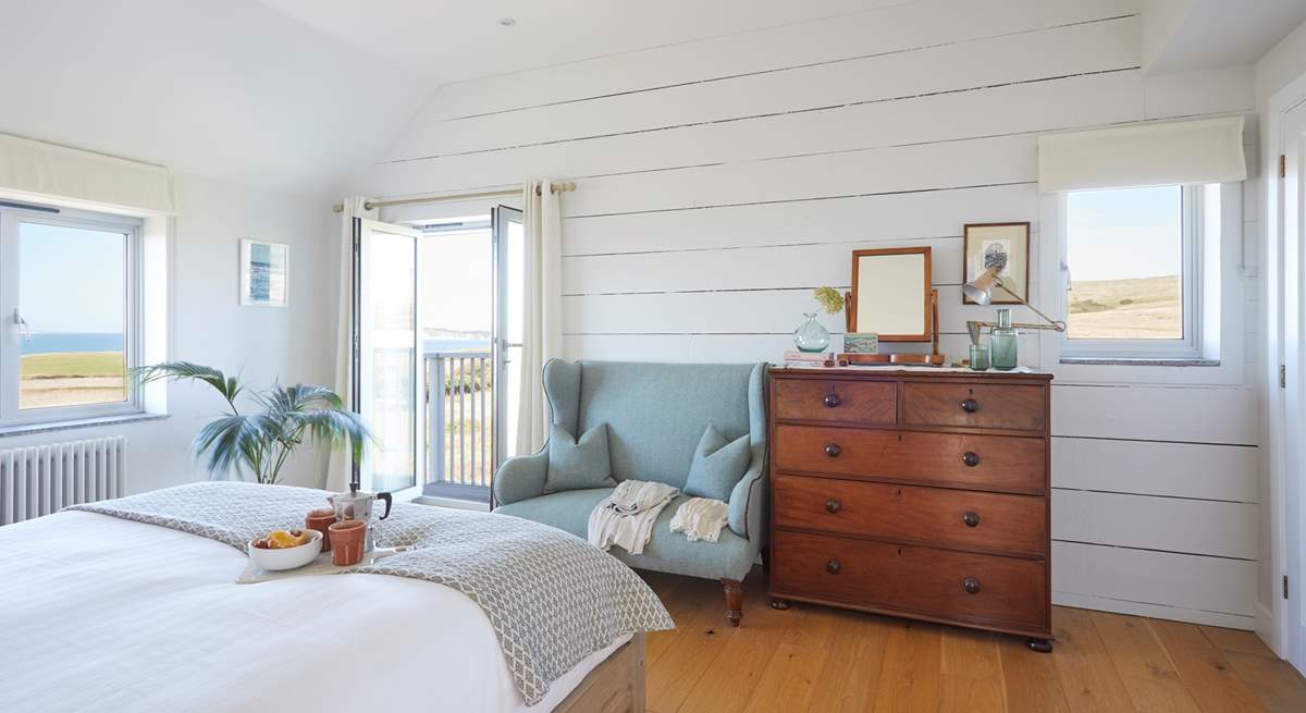 Bedroom 1 boasts panoramic views features its very own balcony.
