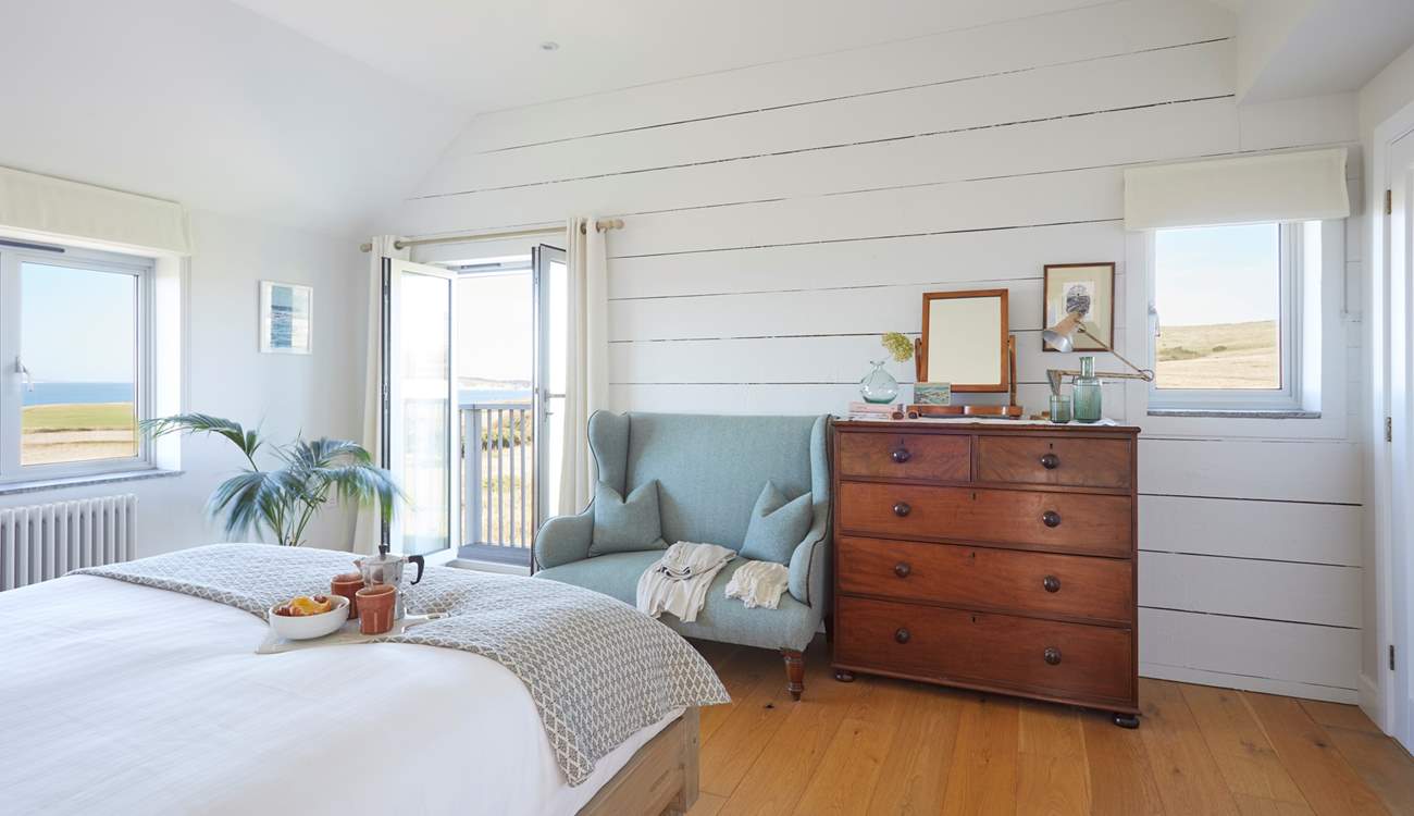 Bedroom 1 boasts panoramic views features its very own balcony.
