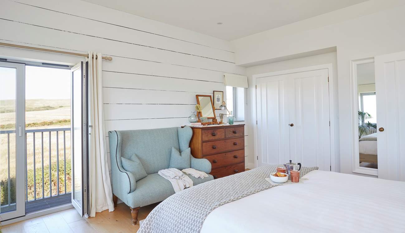 Why not have breakfast in bed and open the balcony doors to let in the morning breeze.