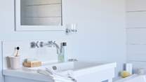 Enjoy a soak in the bath after a long day of island activities.