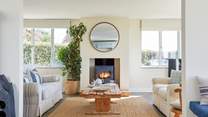 The cosy sitting area features a wood-burner for those chilly evenings.