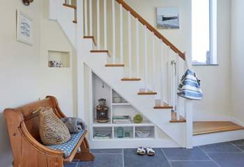 The entrance hall with stairs leading to first floor.