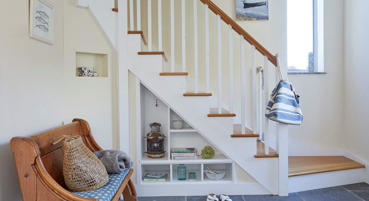 The entrance hall with stairs leading to first floor.