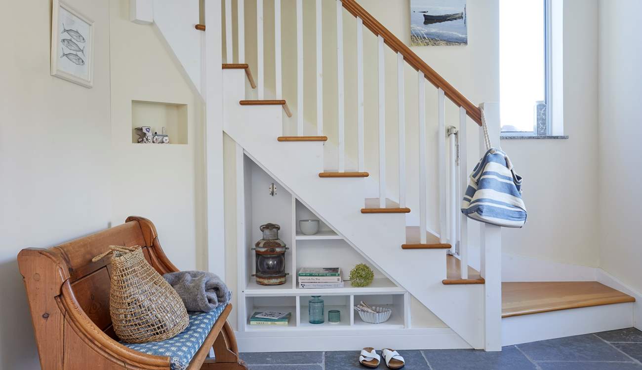 The entrance hall with stairs leading to first floor.