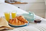 Breakfast in bed? Why not, you are on holiday.