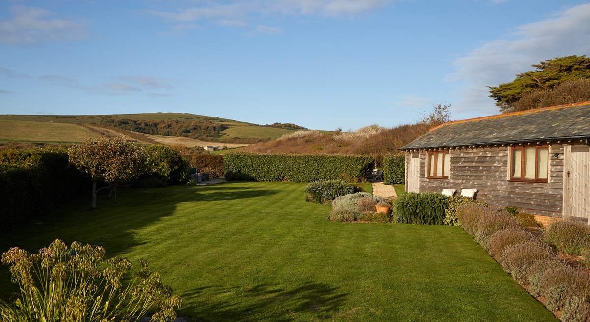 The lawn area is a great place for some garden games or for the family dog to enjoy. 