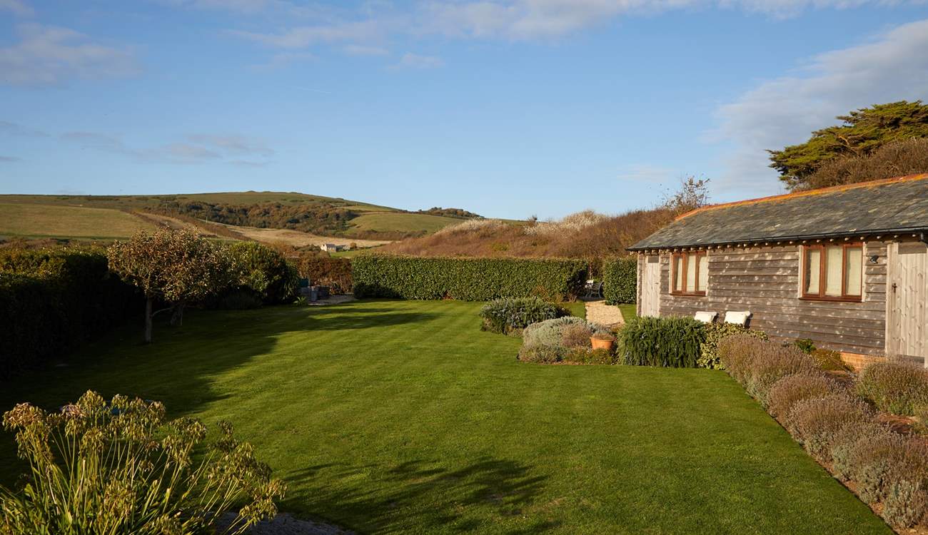 The lawn area is a great place for some garden games or for the family dog to enjoy. 