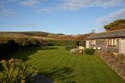 The lawn area is a great place for some garden games or for the family dog to enjoy.