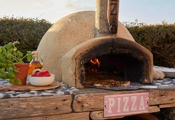 Try your hand at freshly made pizza, enjoyed sitting in the sunshine. 