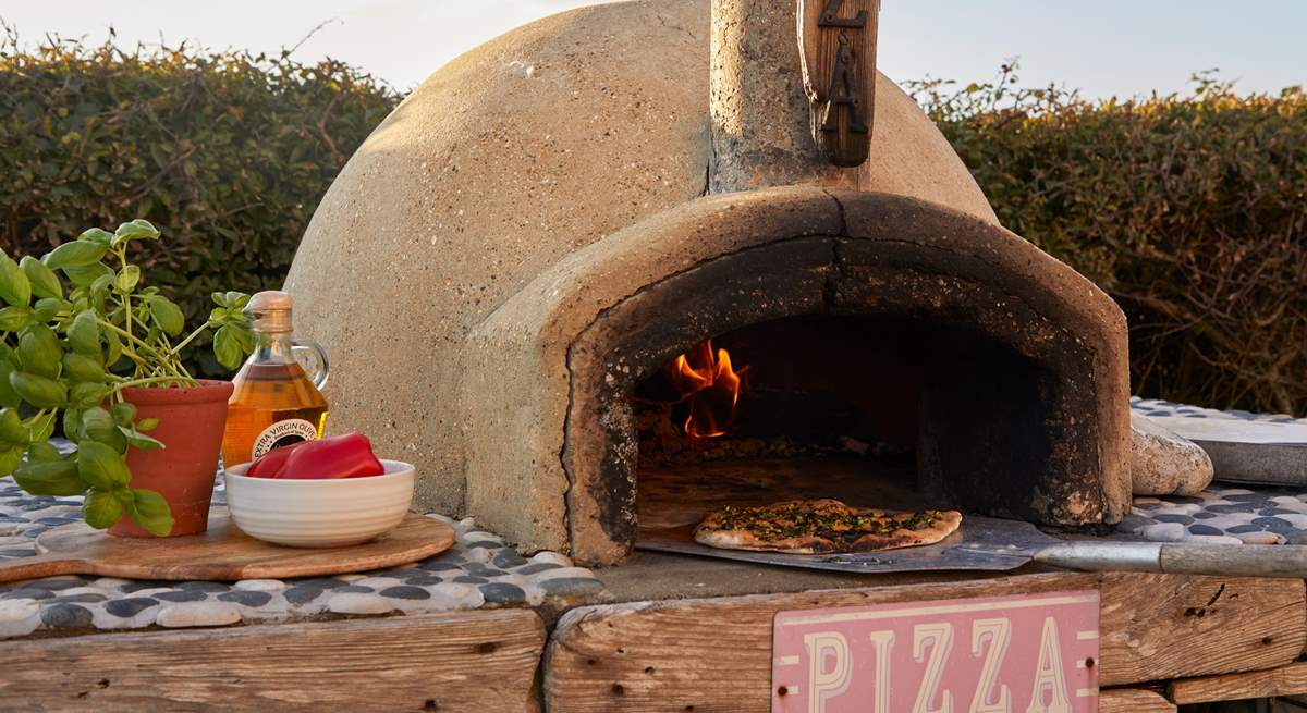 Try your hand at freshly made pizza, enjoyed sitting in the sunshine. 