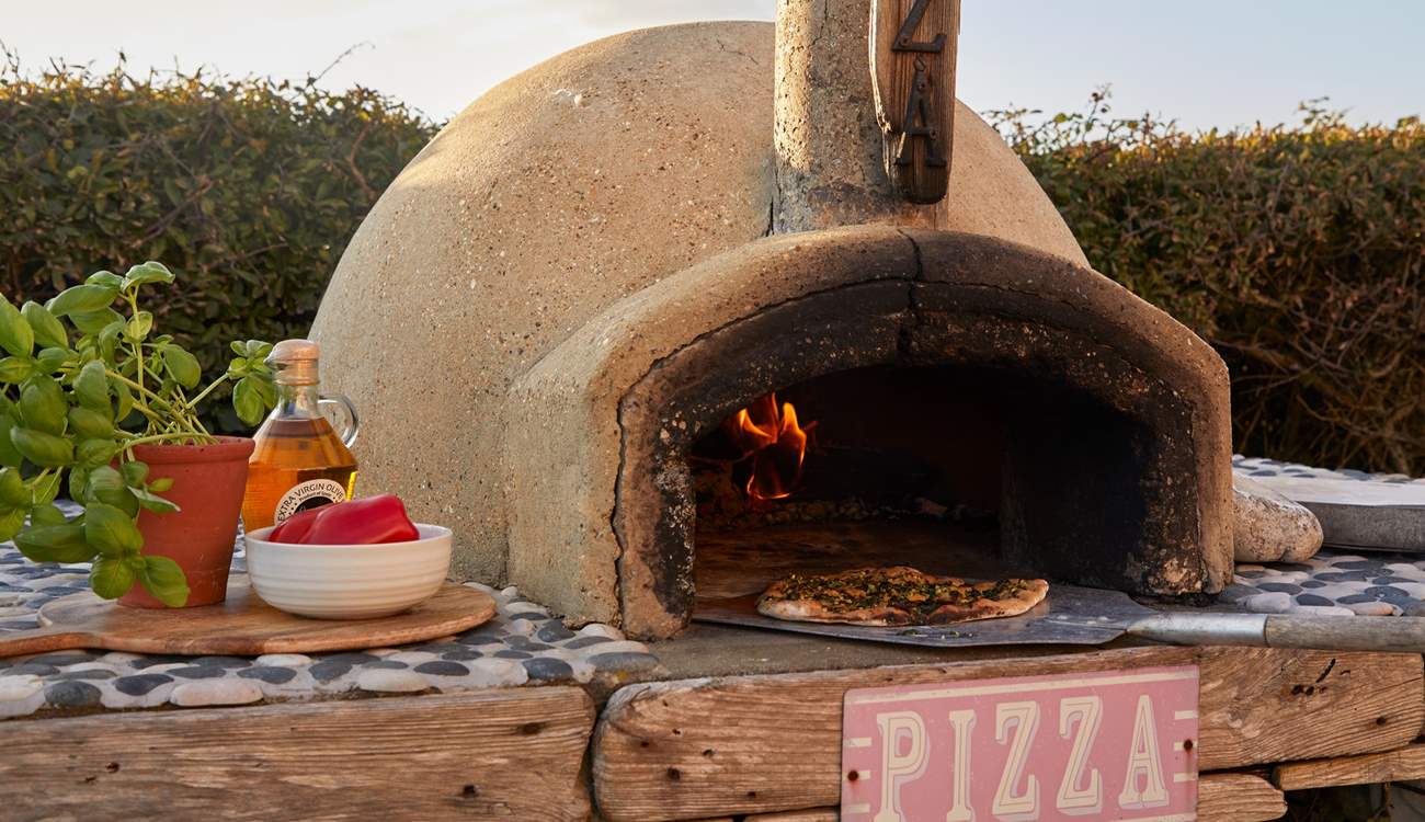 Try your hand at freshly made pizza, enjoyed sitting in the sunshine. 