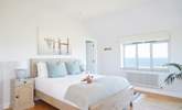 Bedroom 1 is beautifully furnished in pastel shades for a restful night.  - Thumbnail Image