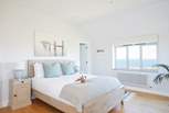 Bedroom 1 is beautifully furnished in pastel shades for a restful night. 