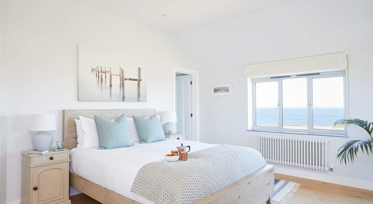 Bedroom 1 is beautifully furnished in pastel shades for a restful night. 