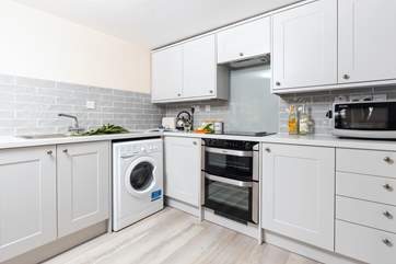 The stylish kitchen has all you will need.