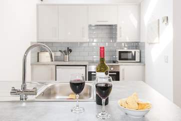 The new kitchen has vaulted ceilings and wooden beams giving a lovely cottage feel throughout.