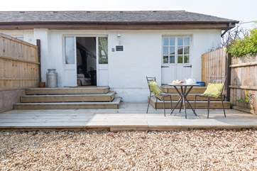 The doors from the living-area open straight onto the decking.