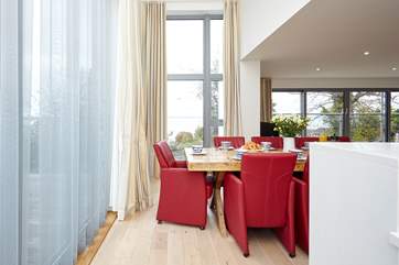A fabulous room with spectacular views to enjoy a relaxed dinner party with family.