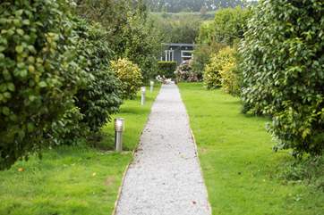 Cuddle Cabin is set at the end of a tree-lined pathway within the owners' smallholding - a perfect romatic retreat.