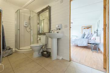 Inbetween the living-room and the bedroom is the en suite shower-room.