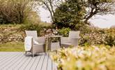 Surround yourself in nature on the pretty patio. - Thumbnail Image