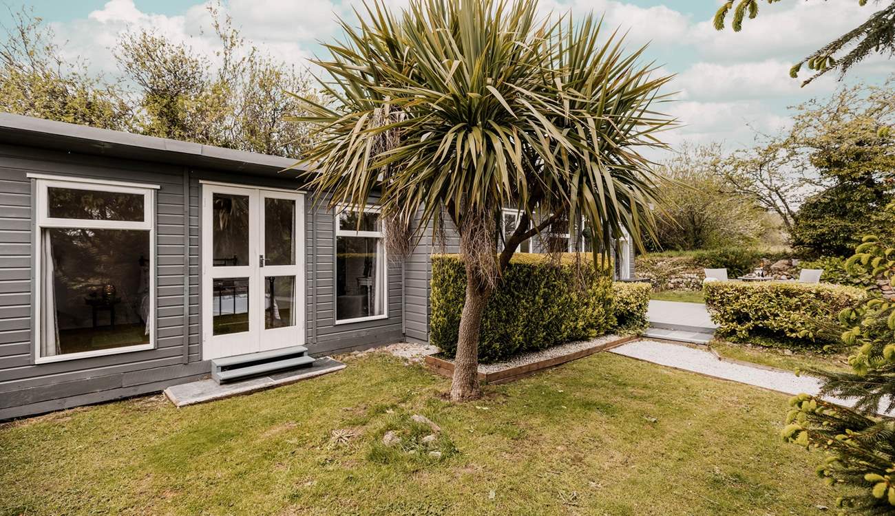 Surrounded by pretty gardens, your privacy is assured here.