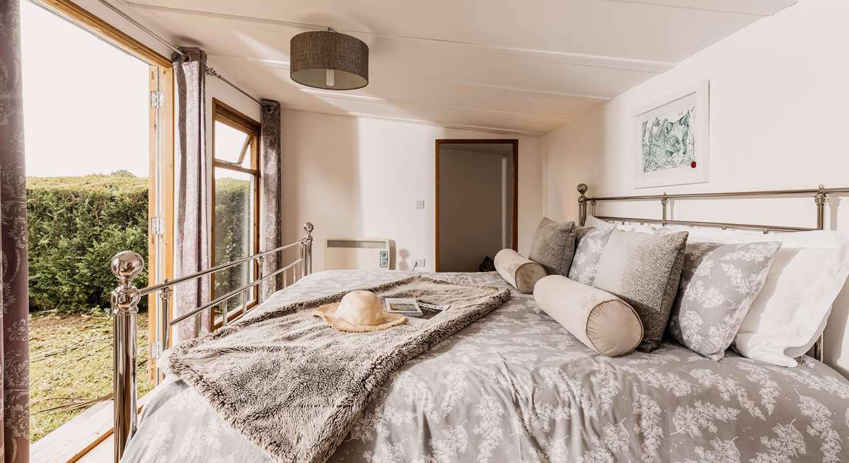 The bedroom has a lovely outlook of your private outside space, a true hideaway!