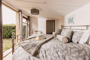The bedroom has a lovely outlook of your private outside space, a true hideaway!