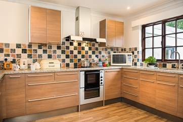 The kitchen is light and airy and has all you need to prepare your holiday meals.