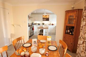 The open plan kitchen/dining-area is a delightful space to entertain and unwind.