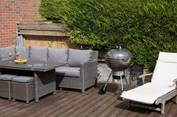 Grab the sausages and pour the cocktails, it's barbecue time.