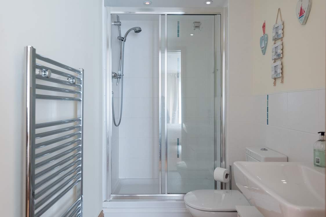 The shower-room en suite to Bedroom 1.