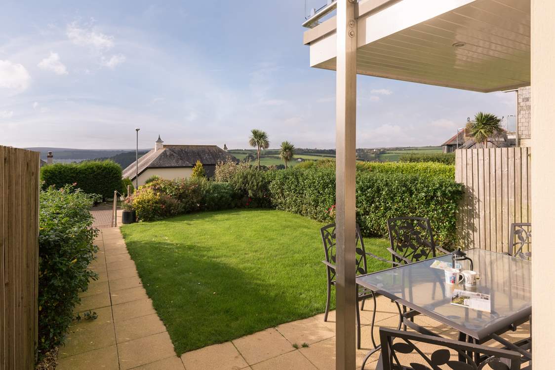 The patio-area and garden (parking is at the end of the garden, accessed via a few steps).