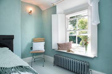 The cottage has been restored with great care and attention - lovely sash windows, wooden floors and vintage-style radiators!