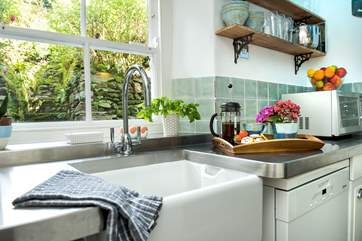 ...complete with Belfast sink and lovely stainless steel work surfaces.