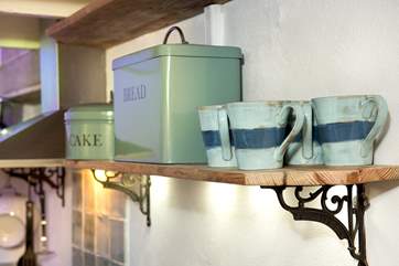 The kitchen is well-equipped with gorgeous crockery.