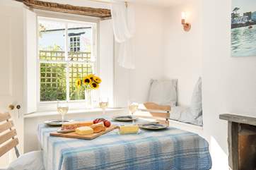 The dining-room also doubles up as a snug with a large TV, ideal for catching up on some holiday viewing or perhaps a film.