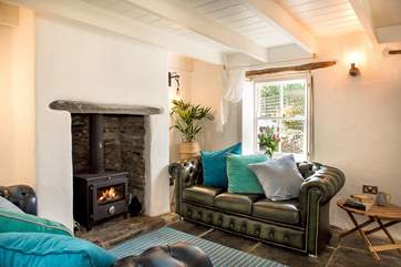 There are beautiful features throughout - hand-made window shutters, original slate floors, and of course that all important wood-burner making this an ideal retreat all year round.