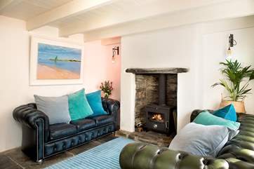 The comfy sitting room showing some of the owner's artwork.