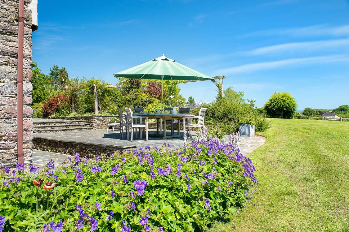With such a wonderful backdrop you are sure to enjoy meals outside as often as you can.