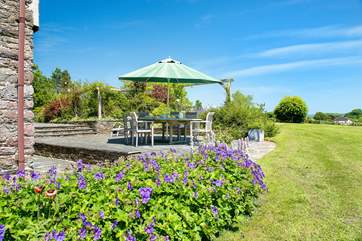 With such a wonderful backdrop you are sure to enjoy meals outside as often as you can.