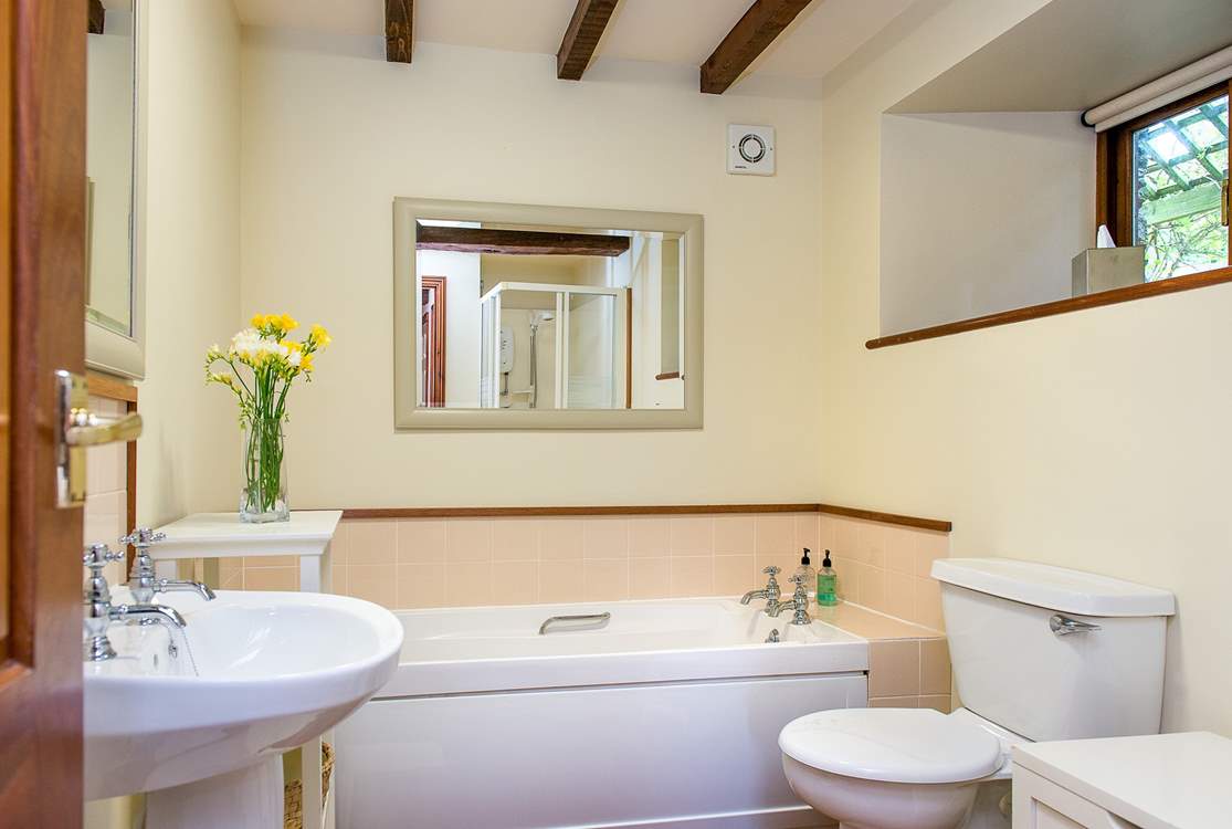 The family bathroom on the ground floor, which also has a separate shower cubicle.