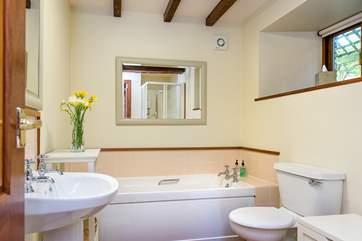 The family bathroom on the ground floor, which also has a separate shower cubicle.