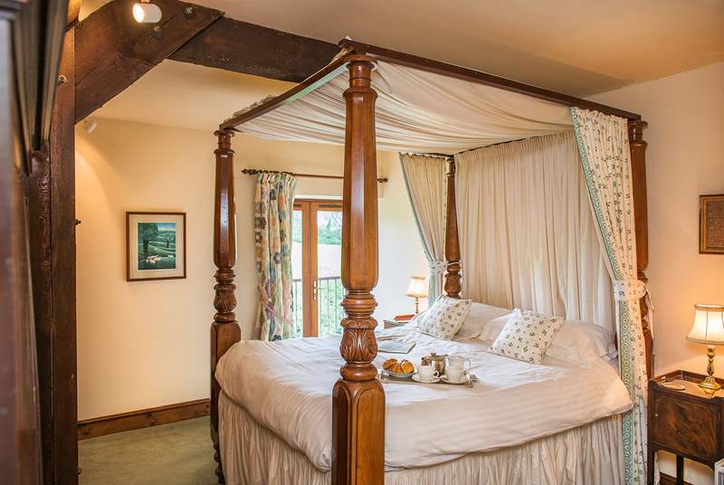 Bedroom 3 has a fabulous four-poster bed.
