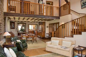 The double height, open plan sitting/dining-room.