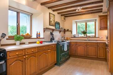In true country-style the kitchen has a lovely Aga.