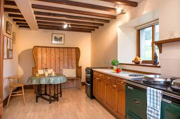 There's a small dining-area in the kitchen - perfect for a quick breakfast or morning coffee. (Please note, for 2023, the Aga is ornamental).