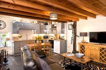 Not so little inside! The open plan living area has plenty of room.