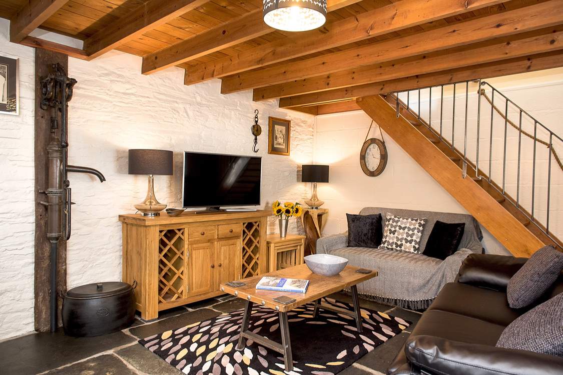 The sitting-area has two comfy sofas, so plenty of room to unwind and relax.
